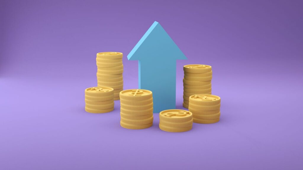 Gold coins with an upward arrow