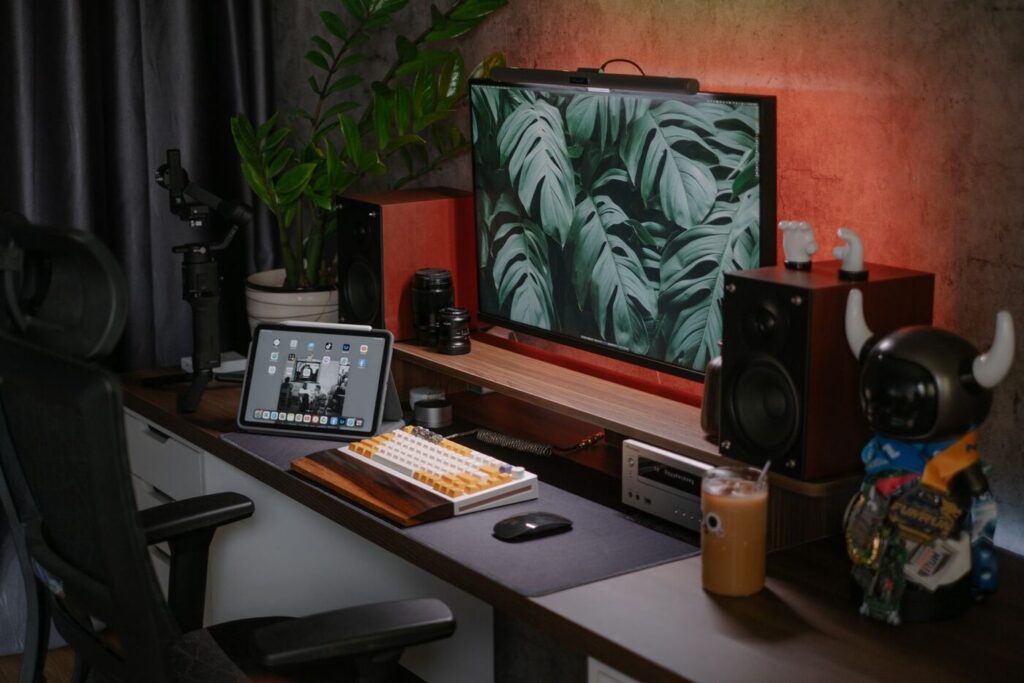 Home office desk with a computer and tablet