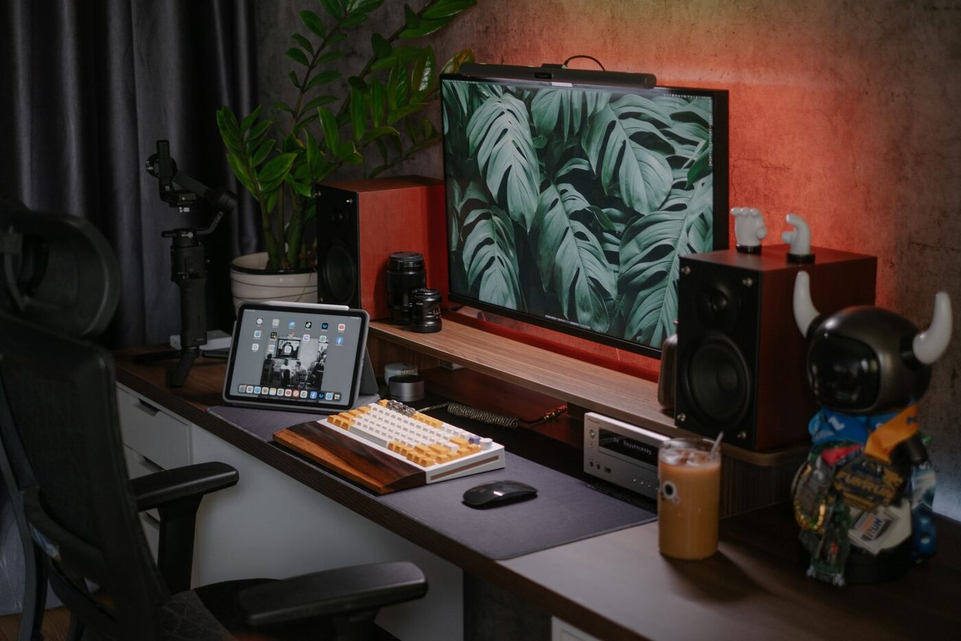 Home office desk with a computer and tablet